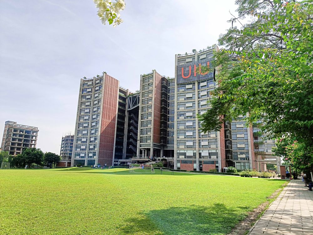 UIU academic towers seen from the campus green